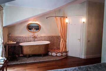 Фото номера Двухместный номер Делюкс с 1 кроватью и балконом Отель Divas Upes mini SPA г. Кокнесе 4